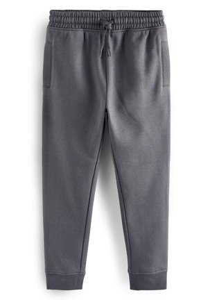 Pantalon de jogging gris charbon avec taille élastique, cordon ajustable, poches latérales et poignets côtelés aux chevilles.