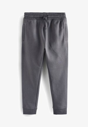 Pantalon de jogging gris charbon avec taille élastique, cordon ajustable, poches latérales et poignets côtelés aux chevilles.