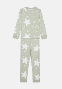 Grünes Baumwoll-Pyjama-Set mit langen Ärmeln und Hose, bedeckt mit weißen Sternen in verschiedenen Größen. Weicher, leichter Stoff mit Stretch.