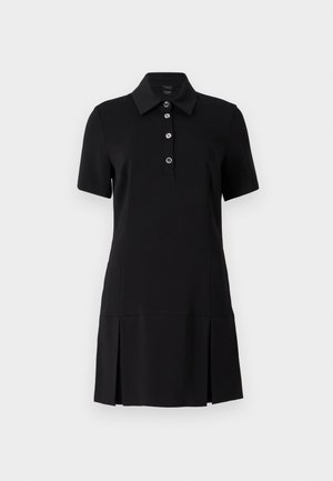 Zwarte polojurk met een kraag, korte mouwen, een vijfknopenlijst en een geplooide rok. Gemaakt van een gladde, rekbare stof voor extra comfort.