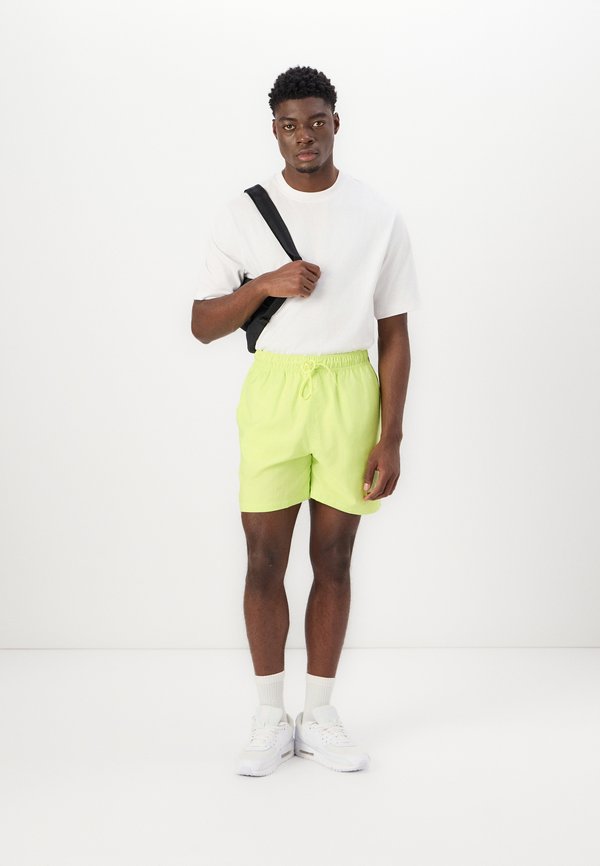 CLUB FLOW - Tracksuit bottoms - lemon twist4