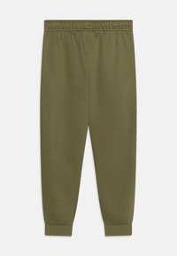 Pantalons de survêtement vert olive en tissu doux et texturé. Comprend une taille élastique et des poignets aux chevilles pour le confort et un ajustement serré.