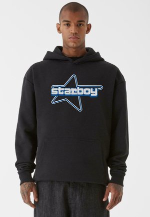 Black hoodie with a large blue star logo and "starboy" text in light blue. Features a front pocket and ribbed cuffs. Cotton blend material.