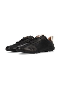 Schwarze Lederschuhe mit glatter Oberfläche, runder Zehenform, durchbrochenen Details und kontrastierendem off-white Fersenbereich.