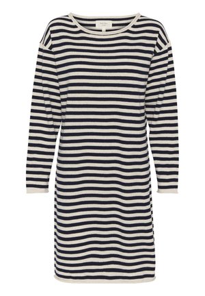 Csíkos ruházat, tengerészkék és fehér vízszintes csíkokkal, hosszú ujjak és kerek nyakkivágás. Az anyag lágy kinézetű, laza fazonnal.