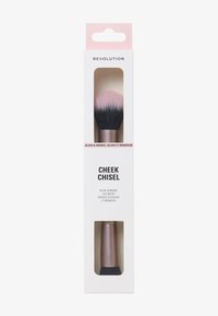 Pennello duale blush e bronzer con setole rosa chiaro e nere. Presenta un manico in oro rosa e un packaging con una finestra frontale trasparente.