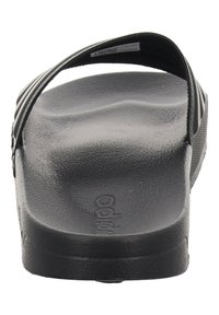 Black sandals with a wide strap and textured footbed. Made of rubber, featuring a smooth surface and slight arch support design.