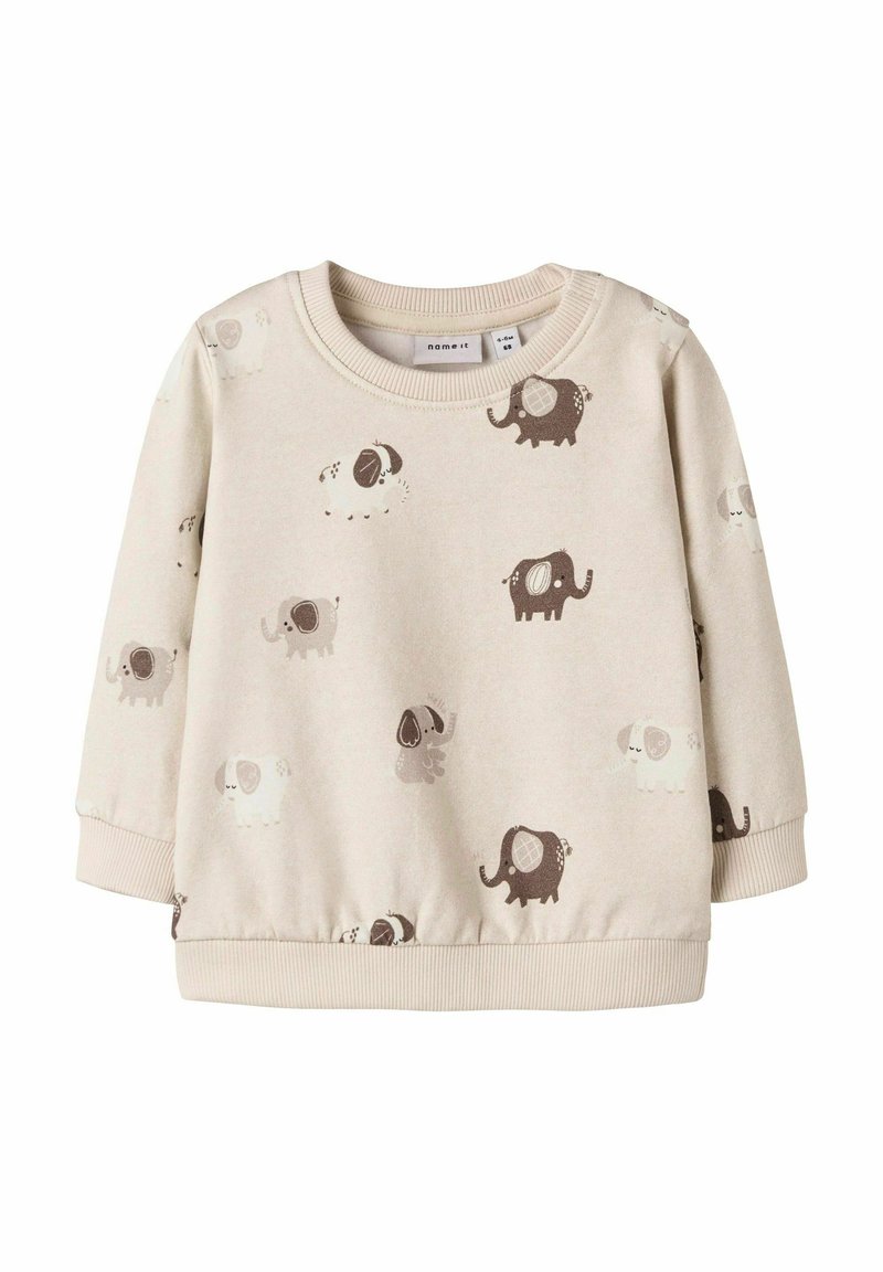 Sudadera beige claro con una textura suave, que presenta divertidos patrones de elefantes y perros en gris y marrón. Puños y dobladillo acanalados.