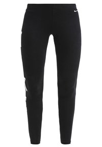 Svarta leggings i stretchn material, med en åtsittande design, en logodetalj i vitt och en jämn yta. Inga fickor synliga.