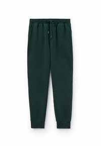 Donkergroene sweatpants van zachte katoen. Elastische tailleband met trekkoord en taps toelopende boorden. Twee zijzakken, minimaal ontwerp.