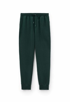 Dunkelgrüne Sweatpants aus weichem Baumwollmaterial. Elastischer Bund mit Kordelzug und schmal zulaufenden Bündchen. Zwei Seitentaschen, minimalistisches Design.