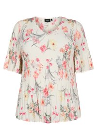 Blusa floreale con scollo a V, maniche corte a palloncino e trama plissettata. Sfondo di un leggero crema con motivi floreali rosa, gialli e verdi.