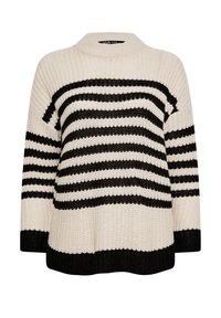 Stickad tröja med en krämfärgad bas och svarta horisontella ränder. Har en hög krage och vida ärmar, tydlig ribbad nederkant längst ner.