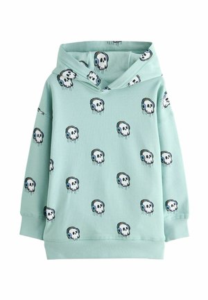 Haut à capuche bleu clair avec un motif de skull répété portant des écouteurs. Fabriqué en tissu doux, il a une coupe décontractée et une poche kangourou à l'avant.