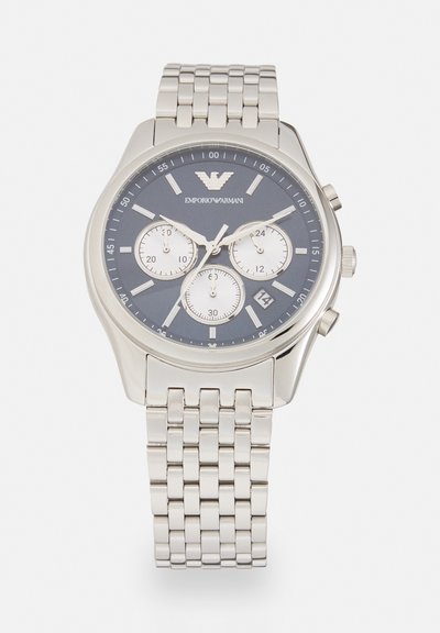 Silberne Emporio Armani Armbanduhr mit blauem Zifferblatt, drei Hilfszifferblättern, Datumsfenster und Gliederarmband aus Metall.