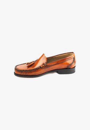 Brown leather loafer with a tassel detail, stitched edge, and a low black rubber sole. Smooth texture with a polished finish.