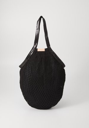 Black woven tote bag with an oval shape, featuring smooth handles and a textured net-like design. Label visible on the side.