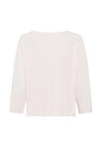 Chemise beige clair unie à manches longues avec un ourlet droit et un large col arrondi, vue de dos sur fond blanc.