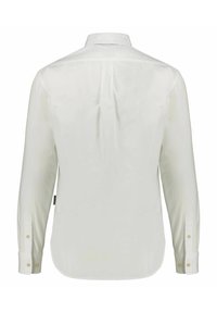 Camicia bianca a maniche lunghe realizzata in tessuto morbido. Presenta un colletto classico, polsini con bottoni e una piega sul retro per garantire comfort.