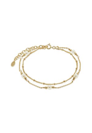 Bracciale a doppia catena in oro delicato con piccole perle d'oro e perle bianche, chiusura rotonda e catena di estensione regolabile.