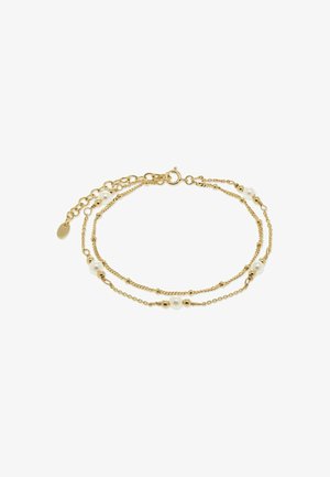 Bracelet délicat en double chaîne dorée avec de petites perles dorées et des perles blanches, fermoir rond et chaîne d'extension ajustable.