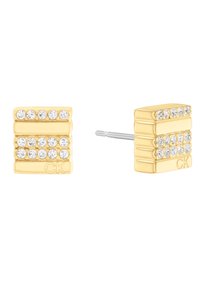 Boucles d'oreilles en métal doré avec trois rangées de cristaux transparents, au design rectangulaire et avec fermoir à tige. Le logo CK est présent d'un côté.