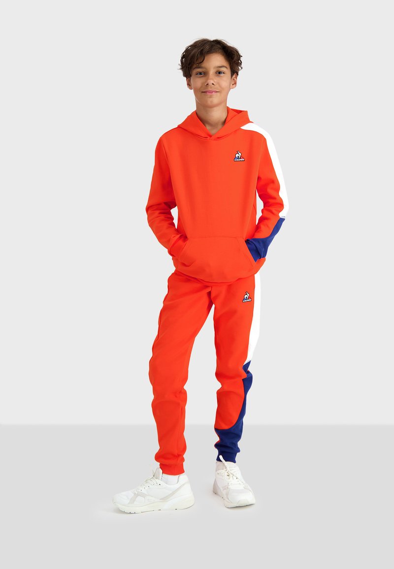 pantalon coq sportif orange