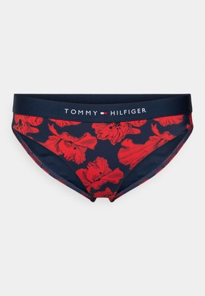 Granatowe bikini z wyrazistym czerwonym kwiatowym wzorem. Posiada wygodny elastyczny pas z wyraźnie widocznym logo "TOMMY HILFIGER".