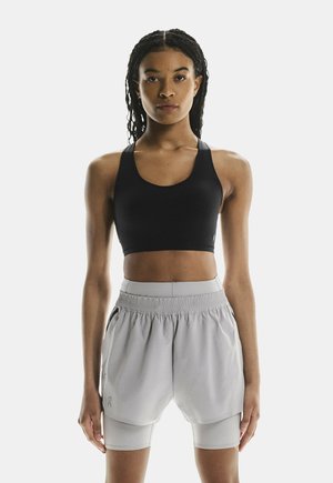TRAIN - Medium support sports bra - black