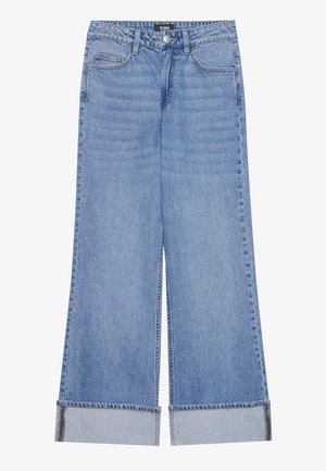 Ljusblå, vida jeans i denim med hög midja, framfickor och uppvikta benslut. Utmärkande blå sömmar som detaljer.