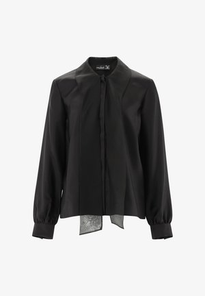 Schwarze Bluse aus glattem Stoff mit einem kontrastierenden, durchsichtigen Saum, strukturiertem Kragen und langen, gepufften Ärmeln mit geknöpften Manschetten.