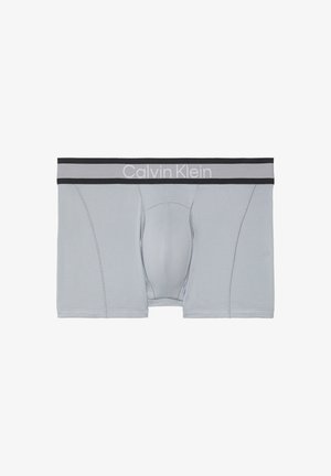 Lysegrå herreboxershorts med sort og gråt elastikbånd med "Calvin Klein"-logo i hvid.