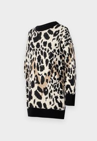 Pull en tricot noir, beige et crème avec un motif léopard, col rond, et poignets et ourlet côtelés. Tissu texturé.