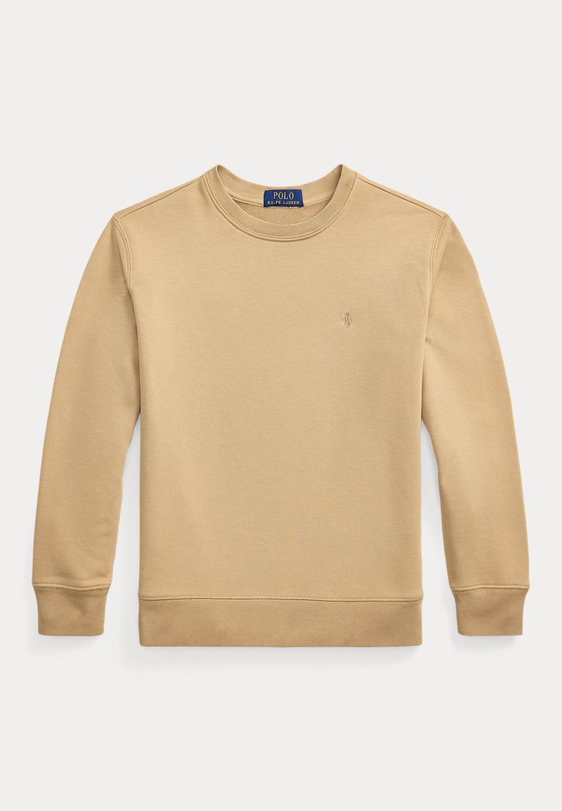 Šviesiai rudas medvilnės džemperis su apvalia iškirpte, ilgomis rankovėmis ir ripsuotais rankogaliais. Priekyje yra mažas siuvinėtas logotipas.