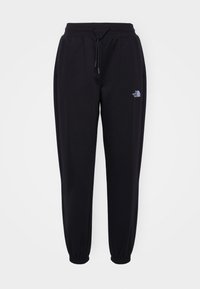 ESSENTIAL JOGGER - Tracksuit bottoms - black