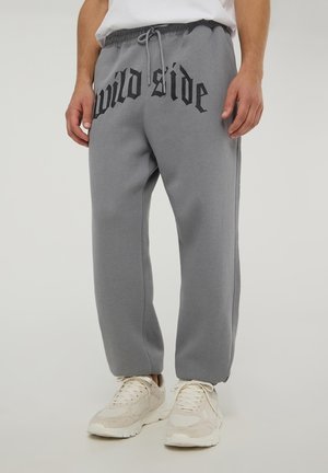 PESANTI CON STAMPA GOTICA - Pantaloni sportivi - grigio piombo