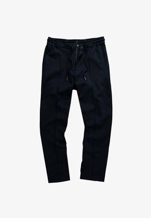 Granatowe joggery wykonane z miękkiego materiału, z elastycznym paskiem w talii z sznurkiem, bocznymi kieszeniami oraz zwężanymi nogawkami z kontrastowymi szwami.