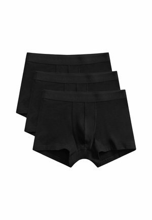 Trois boxers noirs pour hommes empilés avec un design simple et des ceintures élastiques.