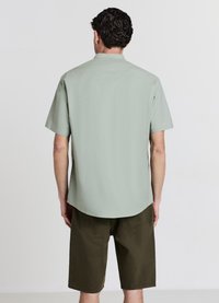 Calliope TASCHE - Jeans Shorts - verde militare