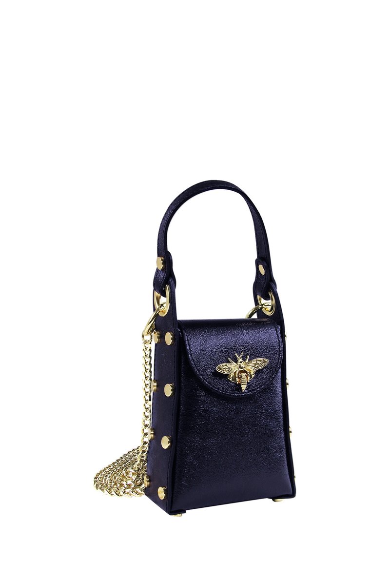 Small navy faux leather handbag with gold hardware, bee detail on the front, and chain strap; features stud accents and smooth texture.