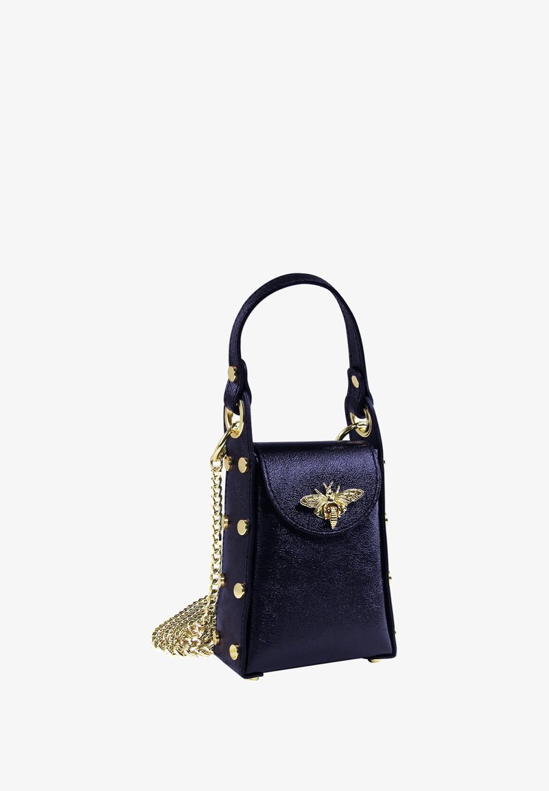 Small navy faux leather handbag with gold hardware, bee detail on the front, and chain strap; features stud accents and smooth texture.