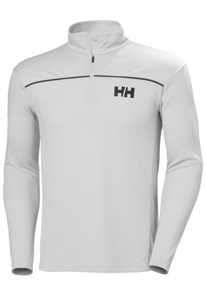 White long-sleeve pullover with a half-zip neck and black accent line; features a black "HH" logo on the left chest. Smooth fabric texture.