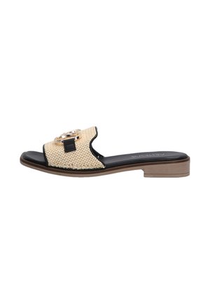 Woven straw slide sandal with black synthetic accents, featuring a gold circular hardware detail. Low stacked heel for stability.