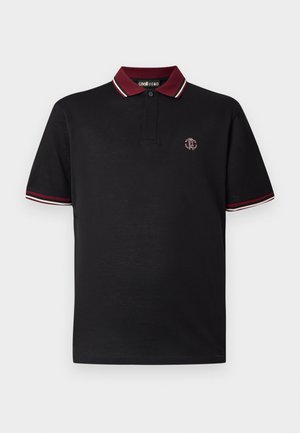 Svart polotrøye med en burgunderkrage med hvite striper. Liten brodert logo på brystet. Kortermet, klassisk passform, bomullsmateriale.