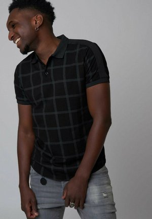 À CARREAUX - Polo - black