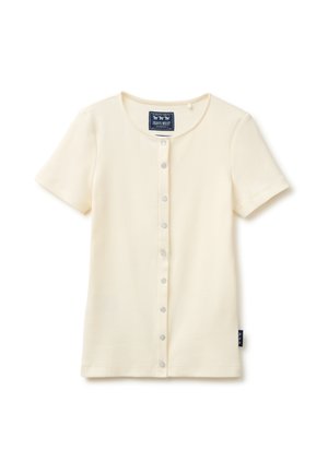 Camiseta de manga corta, color crema, con canalé, escote redondo y botones de presión delanteros, etiquetada como "Jeans West."