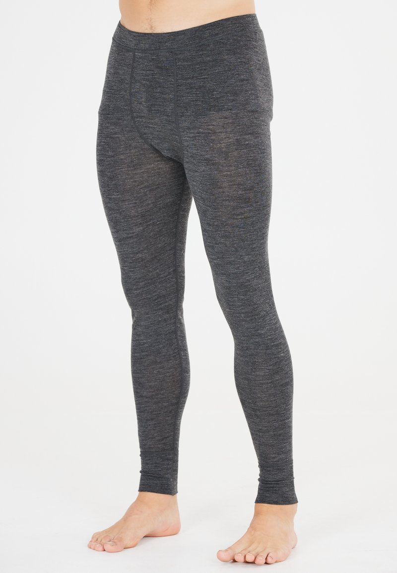 Grå långa leggings tillverkade av ett elastiskt, texturerat tyg, med en figurnära design och elastisk midja, utan synliga mönster eller detaljer.