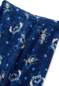 Tessuto in pile blu navy con un motivo ripetitivo di personaggi dei cartoni animati su uno sfondo stellato, con una superficie morbida e pelosa.