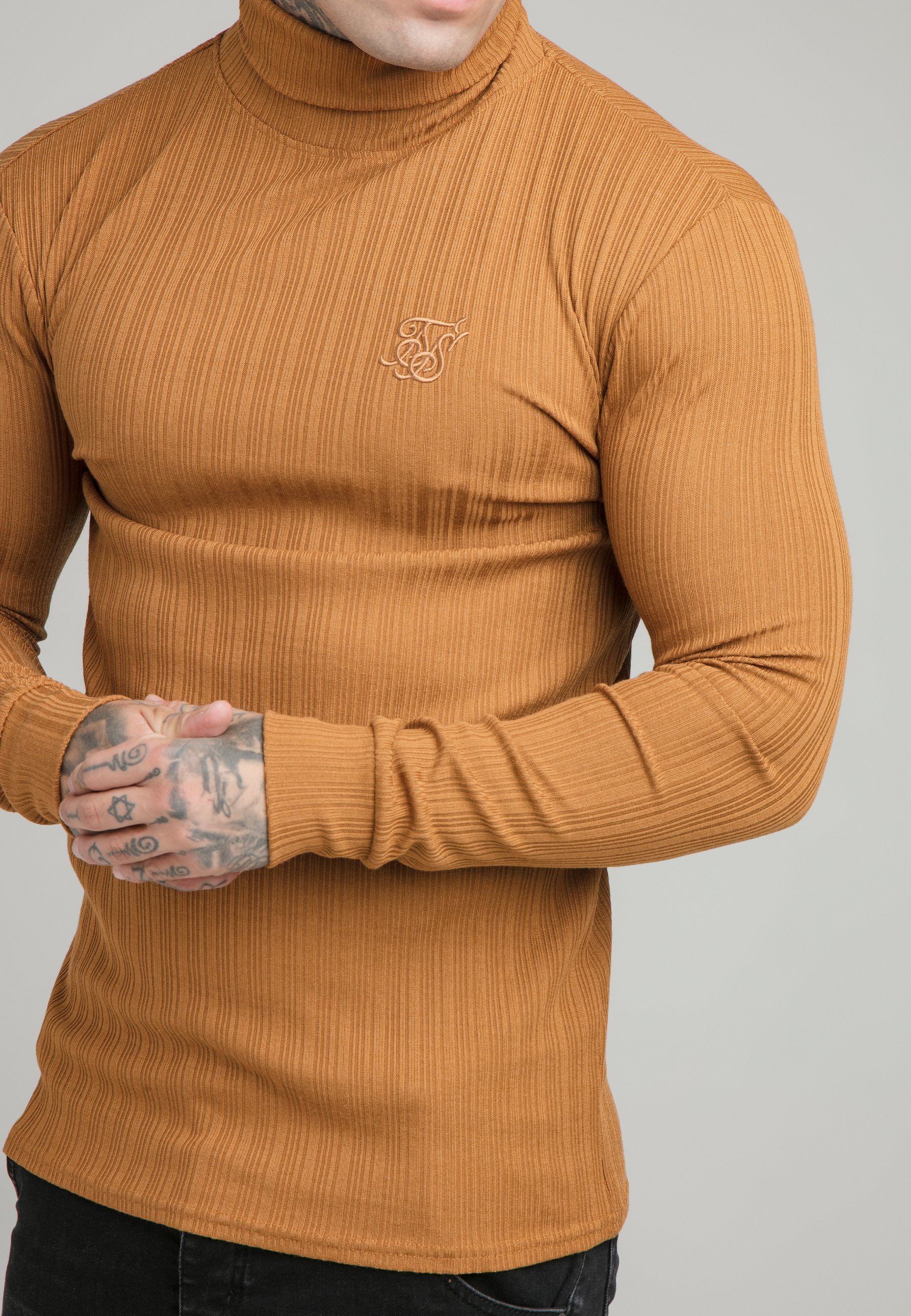 tan polo neck