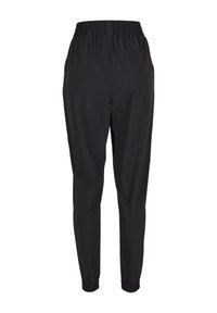 Pantaloni neri con vita elastica e polsini, caratterizzati da una texture liscia, design affusolato e tasche laterali. Tessuto leggero.